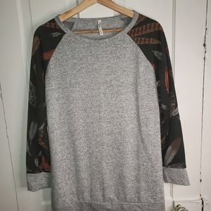 Grey top.